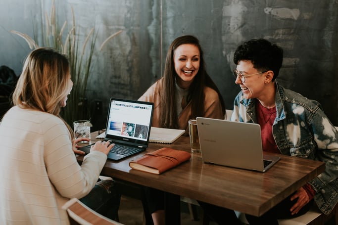 employees around a table